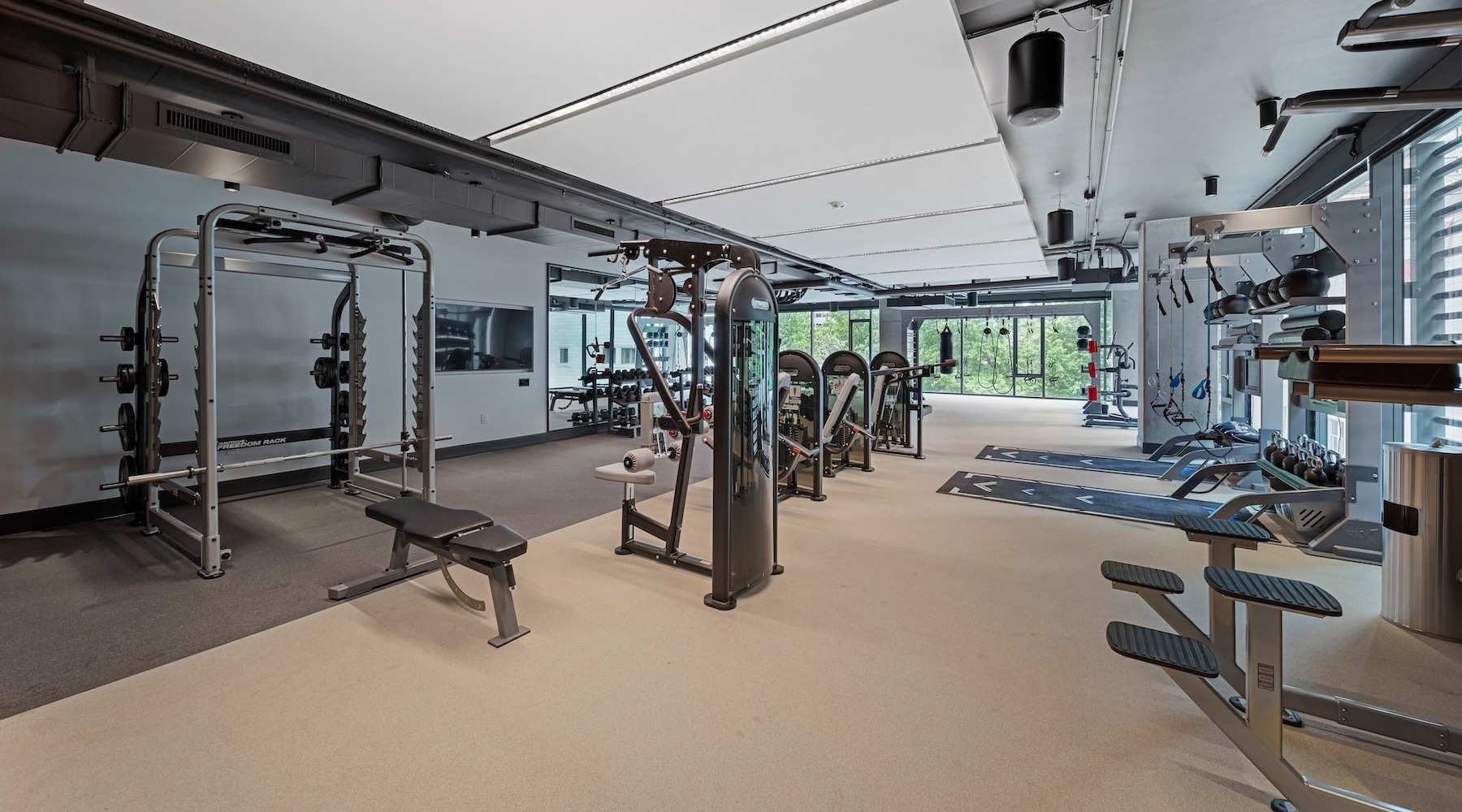 Cutting-edge amenities at your fingertips a gym with exercise equipment